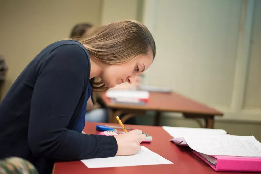 Accounting student taking notes